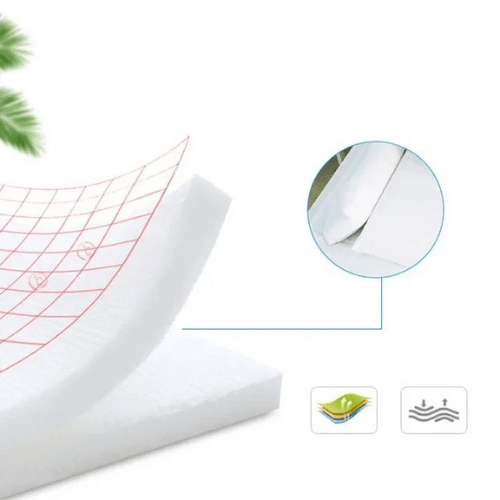 Réducteur de lit bébé ARBRE DE NOËL en coton doux et polyester hypoallergénique, conçu pour un cocon sécurisant et confortable pour nouveau-nés.