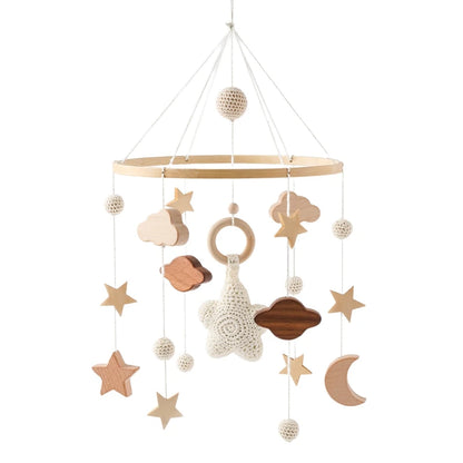 Mobile musical en bois ciel étoilé pour lit de bébé