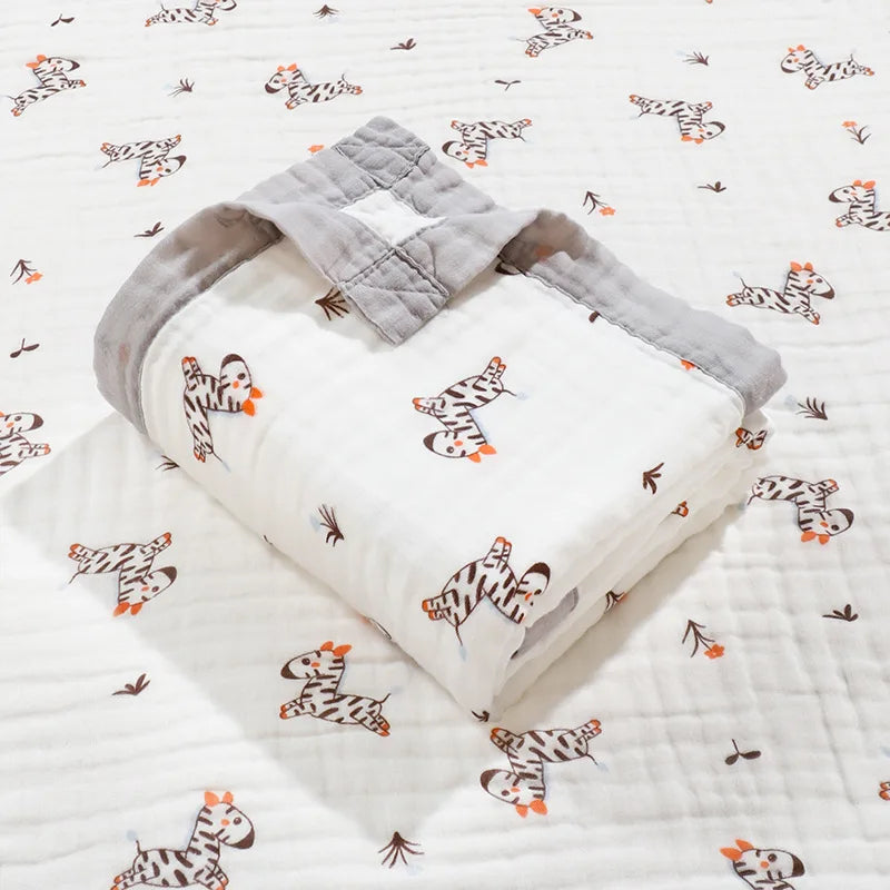 Couverture bebe naissance en gaze de coton – Licornes, lapins ou zèbres