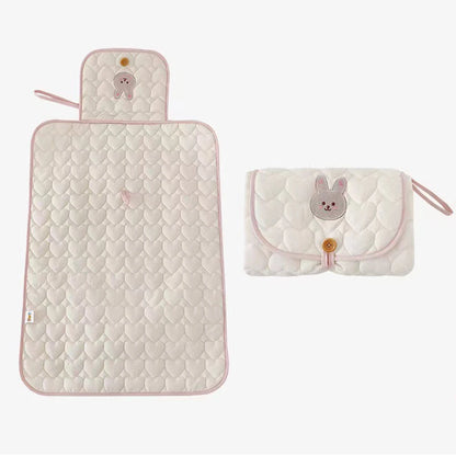 Matelas à langer pliable et nomade pour bébé