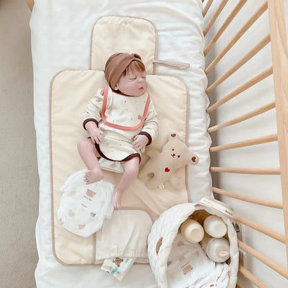Matelas à langer pliable et nomade pour bébé