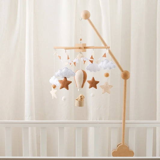 Mobile musical en bois montgolfière en feutrine pour lit de bébé