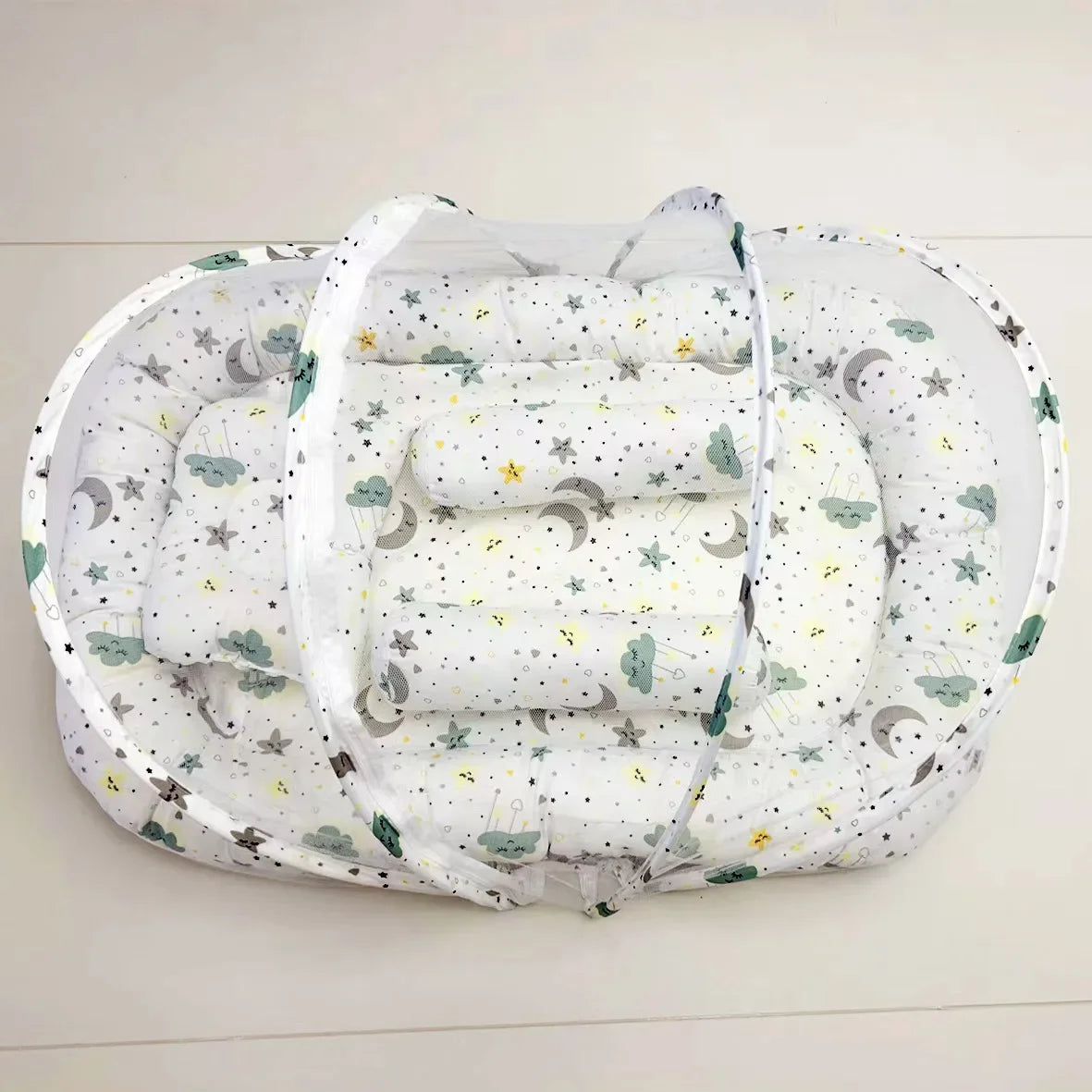 Moustiquaire pour lit bebe – lit nomade pliable bateaux et arcs-en-ciel