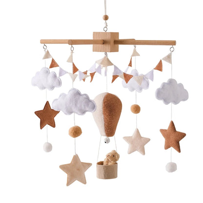 Mobile musical en bois montgolfière en feutrine pour lit de bébé