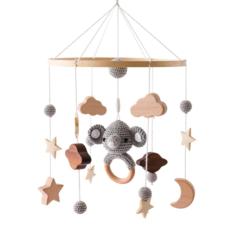 Mobile musical en bois animaux de la savane pour lit de bébé