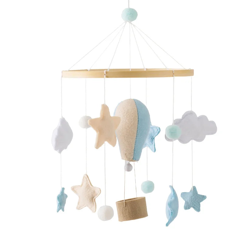 Mobile musical en bois montgolfière en feutrine pour lit de bébé