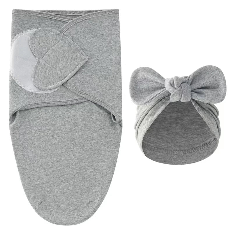 Emmaillotage bebe en coton avec bonnet, coloris unis