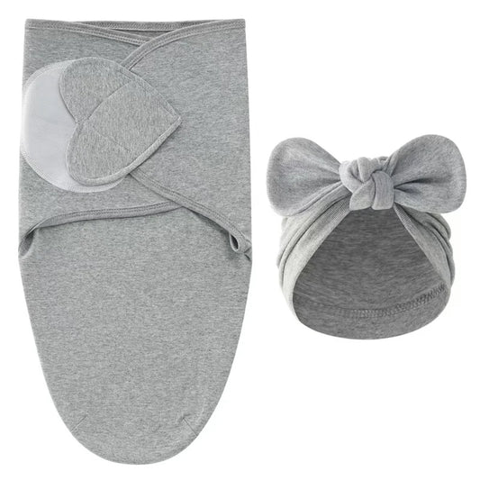 Emmaillotage bebe en coton avec bonnet, coloris unis