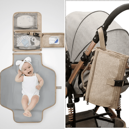 Matelas à langer nomade portable beige avec bébé allongé sur surface rembourrée et sac range-accessoires accroché à une poussette.