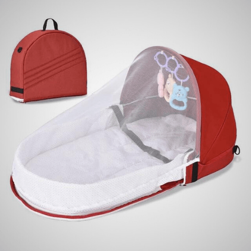 Réducteur de lit bébé BestBabyMosquito™ rouge avec filet anti-insectes et jouets intégrés, portable et pliable.