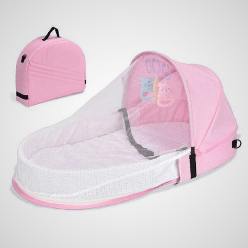 Réducteur de lit bébé rose BestBabyMosquito™ avec filet anti-insectes et jouets intégrés, portable et confortable pour nouveau-nés.