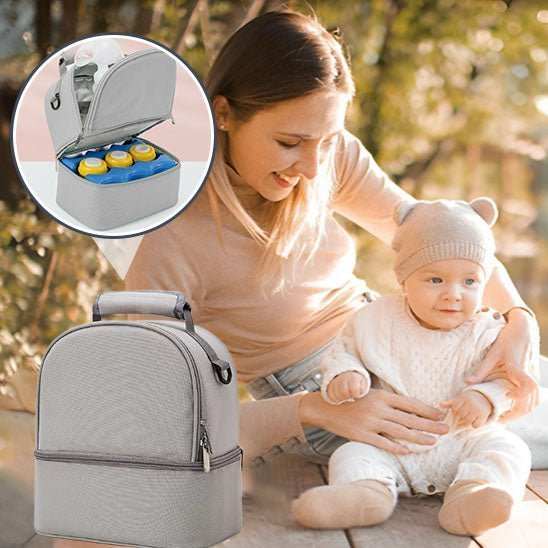 Sac à Langer gris compact avec isolation pour biberons, pratique pour transporter essentiels bébé, avec maman et bébé en arrière-plan en plein air
